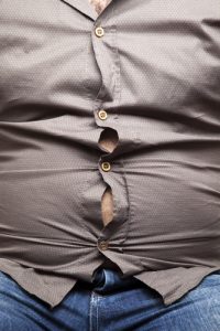 close-up_of_fat_stomach_bursting_through_shirt